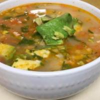 Chicken Soup · With chicken, rice, avocado and pico de gallo.