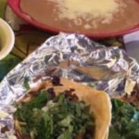 Chori Queso · A bowl of chorizo (Mexican sausage) and nacho cheese.