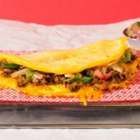 Chorizo Omelette · Omelette filled with chorizo, onion, jalapenos, and cheese.
