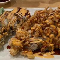 Popcorn Lobster · Special california roll (crab salad, avocado) wit deep-fried lobster on top / eel sauce, spi...