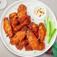 Crispy Wing · Buffalo, sour and chili or BBQ.