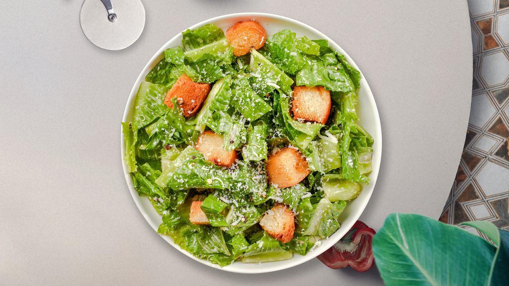 Classic Caesar Salad · (Vegetarian) Romaine lettuce, house croutons, and  parmesan cheese tossed with Caesar dressing.