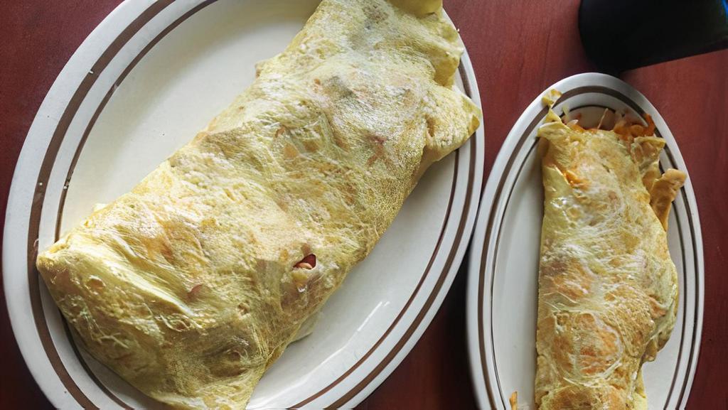 House Omelette · Sausage, ham, bacon, and cheese.  Consuming raw or undercooked meats, poultry, seafood. Shellfish, or eggs may increase your risk of foodborne illness.