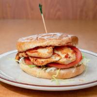 Grilled Chicken Sandwich · Marinated chicken breast with lettuce, tomato and mayo.