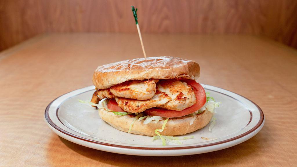 Grilled Chicken Sandwich · Marinated chicken breast with lettuce, tomato and mayo.