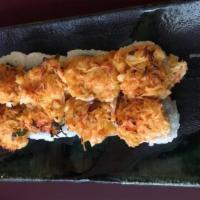 Volcano Roll · Cooked sushi in red. Explosively delicious! A spicy, creamy blend of scallops, crab, scallio...