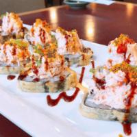 Yummy Roll · Tuna, salmon, yellowtail, crab and cream cheese inside and light tempura topped with Alaskan...