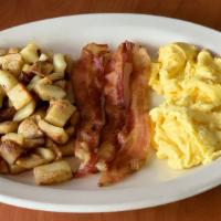Two Egg Breakfast · Two eggs made fresh to order with your choice of hardwood smoked bacon, smoked ham or sausag...