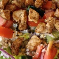 Greek Salad · Lettuce, tomatoes, onion, cucumbers, feta cheese & Greek olives with Greek dressing.