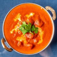 Chicken Tikka Masala · Clay-oven cooked boneless chicken curried with chef's' special sauce.