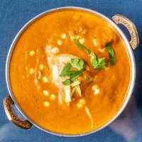 Chicken Makhani · Tandoor grilled chicken shredded cooked with butter and cream.