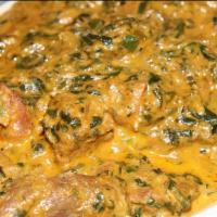 Veda Ra Saag · Chicken and spinach cooked in Nepali traditional style.