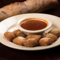 Toasted Ravioli · Choice of meat, cheese or a combination served with Maggie's Sugo