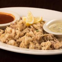 Calamari Fritti · Fried Calamari dusted with seasoned flour served with Maggie's sugo and scampi sauce