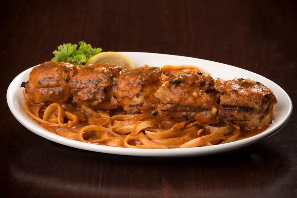 Gabriella · Marinated Chicken breast rolled in Italian bread crumbs skewered and broiled.  Served over fettuccine in a spicy diablo sauce