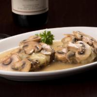 Bistecca Modiga · Two 4oz. beef tenderloin medallions lightly breaded, grilled, topped with provolone cheese, ...
