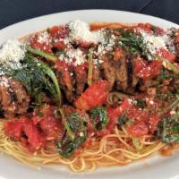Beef Spiedini Georgio · Beef tenderloin Spiedini.  Served with crushed tomatoes, basil, garlic, spinach and olive oi...