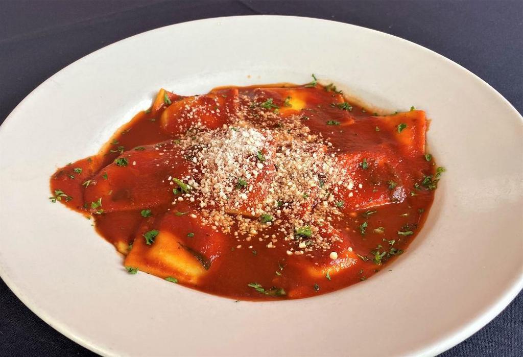 Ravioli · Your choice of Meat, Cheese or a combination of both served in Maggie's sugo