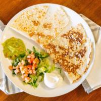 Quesadilla · Cheese with a side of guacamole and sour cream.