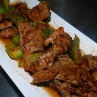 Steak Bites
 · Sirloin marinated in tangy chef sauce with red onions.