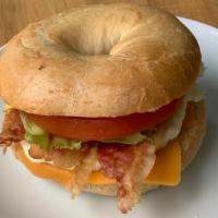 E.L.T · Bacon, Egg, Lettuce , Tomato and Cheese on one of delicious bagels.