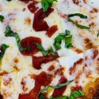 Medium Margherita Pizza  · Big Kel's Marinara, Fresh Basil, Tomatoes, Fresh Mozzarella Cheese and Pizza Cheese 

+Try i...