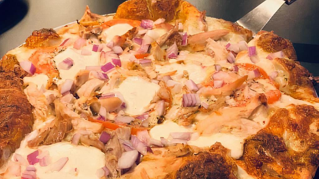 Medium The Caddy'S Chicken Pesto Pizza  · Fresh Pesto Sauce, Fresh Mozzarella Cheese, Pizza Cheese, Big Kel's Roasted Pulled Chicken, Parmesan Tomatoes and Red Onions
