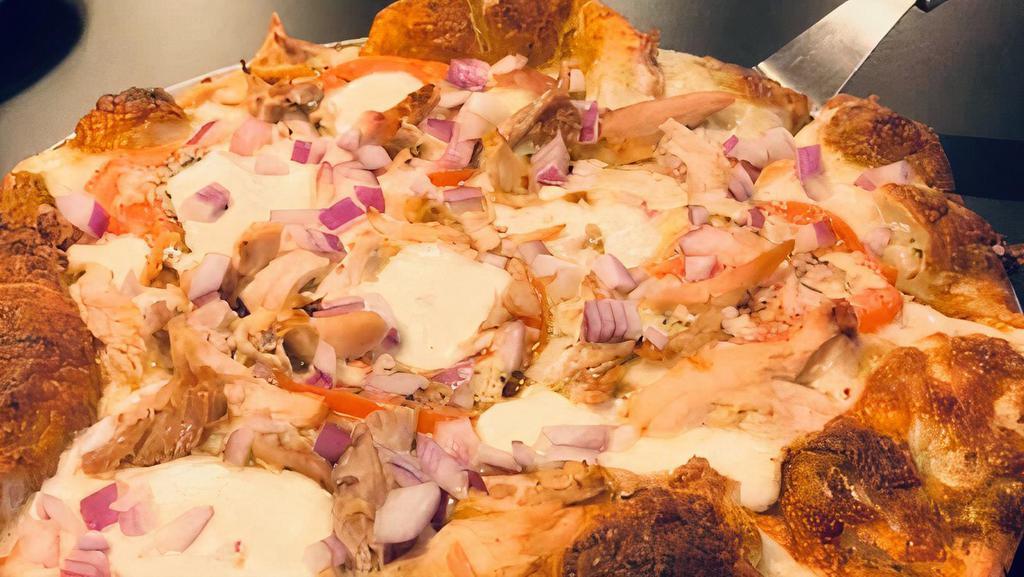 Large The Caddy'S Chicken Pesto Pizza  · Fresh Pesto Sauce, Fresh Mozzarella Cheese, Pizza Cheese, Big Kel's Roasted Pulled Chicken, Parmesan Tomatoes and Red Onions