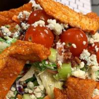 Crispy Buffalo Chicken Salad · Lettuce mix, Red Onions, Bacon, Celery, Carrots, Bleu Cheese Crumbles, Tomato tossed in Crea...