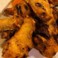 Char Buff Wings · 10 fried jumbo wings tossed in one of our sauces and then finished on the grill. Your choice...