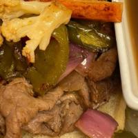 Italian Beef Sandwich · Slow-roasted all-night Italian beef, thinly sliced served with hot giardiniera and homemade ...
