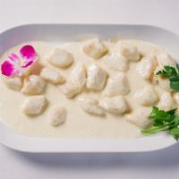 Gnocchi Alla Bava
 · Potato Dumpling with four cheese Piemontese style cream sauce.