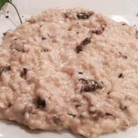 Risotto · Arborio Rice with your choice of White Truffle and Asparagus or Porcini Mushrooms.