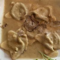 Porcini Mushrooms & Meat Ravioli · Homemade Ravioli with Butter &Truffle Sauce.