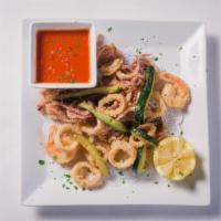 Fritto Mixto Di Pesce Al Italiana 
 · Signature. Fried Shrimp, Calamari, and Zucchini.