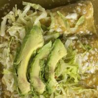 Enchiladas De Mole Poblano
 · 3 Enchiladas filled with Meat or Cheese topped with Mole Sauce, Cheese, Sour Cream and Avoca...