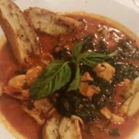 Zuppa Di Pesce
 · Clams, Mussels, Shrimp, Red Snapper, Scallops, Salmon, and Calamari in Spicy Tomato broth wi...