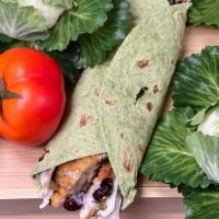 Kale Chicken Wrap · Chicken, kale, cranberry + poppy seed dressing.