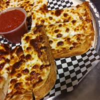 Cheese Bread · Pizza crust with garlic butter seasoning and mozzarella cheese served with a side of marinar...