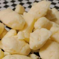 Cheese Curds · 4 ounces of all natural cheddar cheese curds straight from Wisconsin.