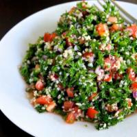 Tabbouleh Salad · Parsley, mint, bulgur, cucumber, olive oil, lemon juice.