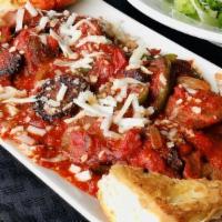 Sausage & Pepper Rustica (Entree) · Sliced Italian sausage sautéed with green peppers and onions tossed in our homemade marinara...
