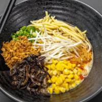 Vegan Miso Ramen · Miso Base, Veggie Broth, Traditional 12+ Hour Boil.
Noodles, Green Onions, Kikurage, Bamboo ...