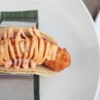 Pescado Taco · Negra modelo beer-battered alaskan cod, chipotle coleslaw. served in flour tortilla.