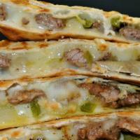 Carne / Meat Quesadilla · Jumbo Meat & Cheese Quesadilla made with a flour tortilla.
Please Specify the Meat Choice.