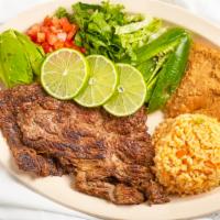 Tampiquena Dinner · 2 enchiladas, skirt steak, rice, and beans. Comes with corn tortillas.