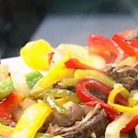 Fajitas Steak · Steak Fajitas, rice and beans. Comes with corn tortillas. The meat is hand-prepared by our b...