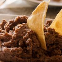 Refried Beans · Pint of pinto beans. homemade.