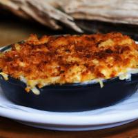 Mac & Cheese · House-made cheese sauce finished with two year Vermont cheddar, a hint of thyme and black pe...