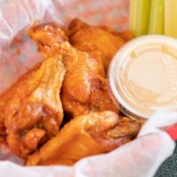 Bench Buffalo Wings (6) · No breading wings drenched in the bench original buffalo sauce. Served with ranch or blue ch...